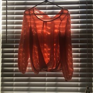 A long sleeve blouse .